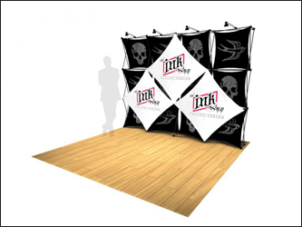 Xpressions stretch fabric trade show pop-up display with frame and graphics.
