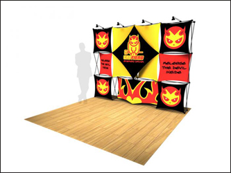 Xpressions pop-up stretch fabric trade show display on floor with graphics.