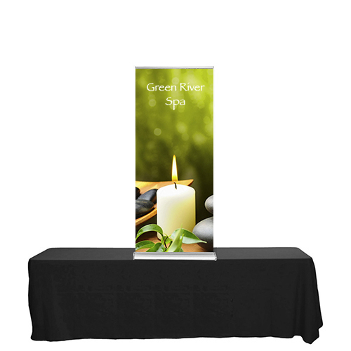 Blade Lite 24 inch retractable banner stand sitting on a tabletop.