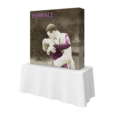 Embrace SEG tabletop display with fabric graphic.