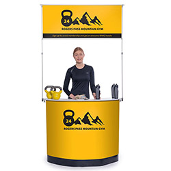 Expand PodiumCase portable presentation counter with graphic and header panel.