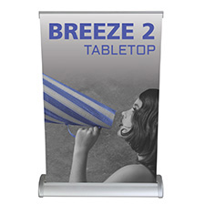 Breeze 2 tabletop retractable banner stand with graphic banner.