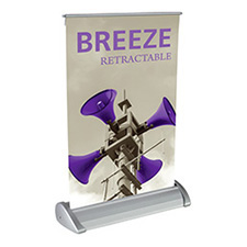 Breeze tabletop retractable banner stand with graphic banner.