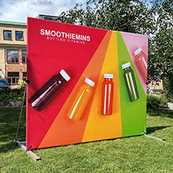 Expand GrandFabric premium outdoor display stand with heavy duty feet, weights and vibrant outdoor fabric graphic.