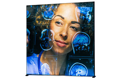 Expand Lightbox Portable trade show display with backlit SEG fabric graphic.