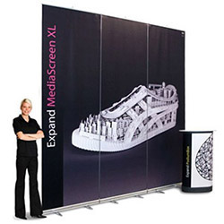 Expand MediaScreen XL large retractable banner stand with rollup graphic banner and slim silver base.