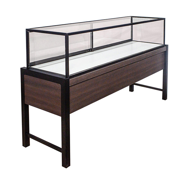 Glass display case for retail with floating wood base and sliding doors.