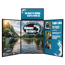 Folding panel portable tabletop display open with graphics on a tabletop with black table cover