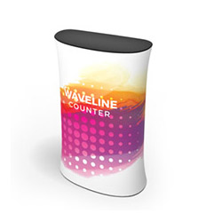 Waveline lightweight portable counter in various sizes with aluminum tube and fabric graphic.